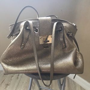 Authentic Choo gold purse.